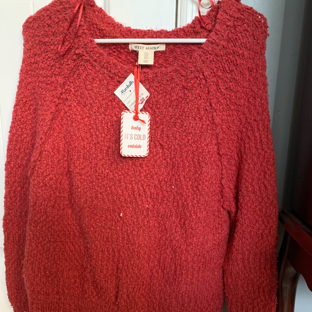 Marshall’s red sweater